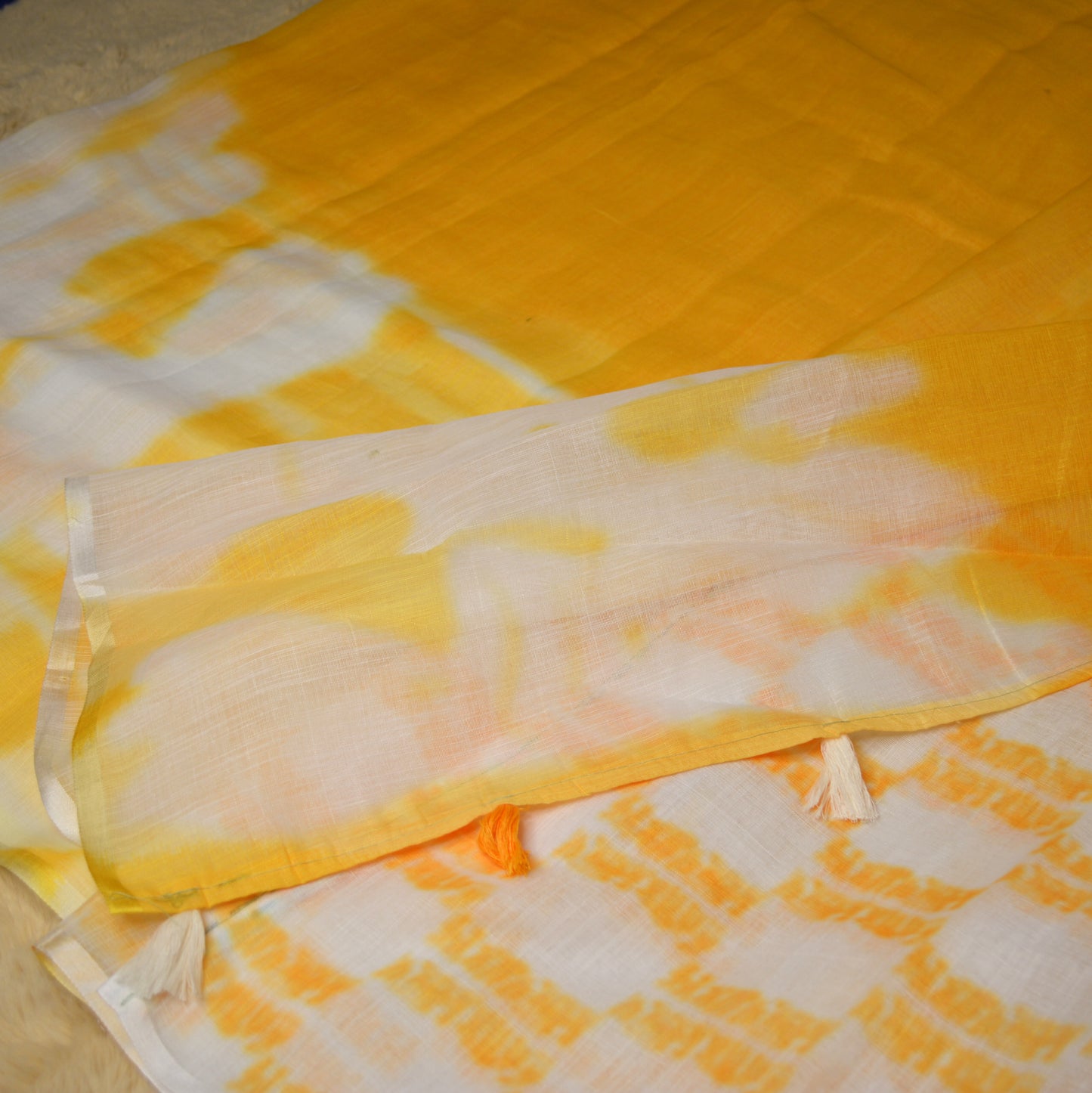 Yellow with white linen shibori print saree
