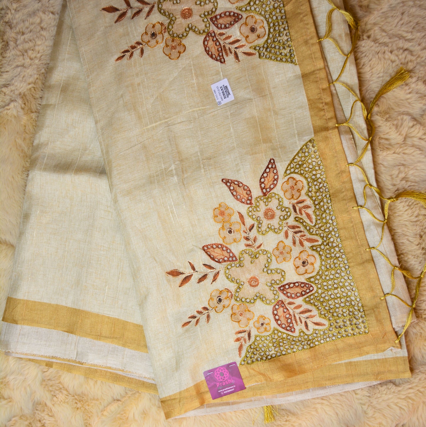 Beige tussar cut work embroidery saree with golden contrast