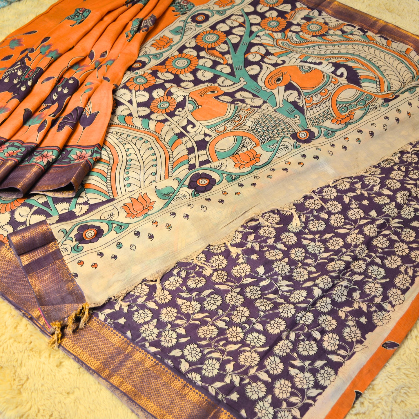 Orange with purple kalamkari silk saree