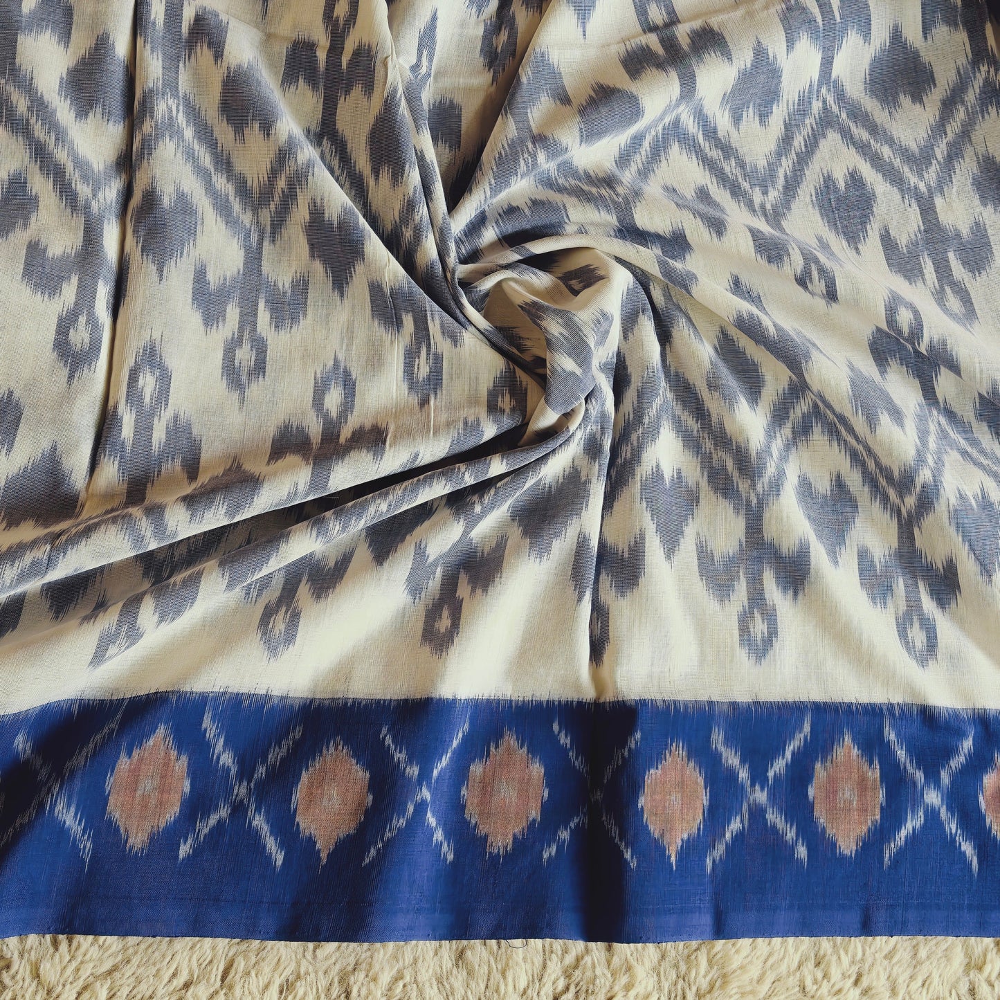 White handloom ikkat pochampalli cotton saree