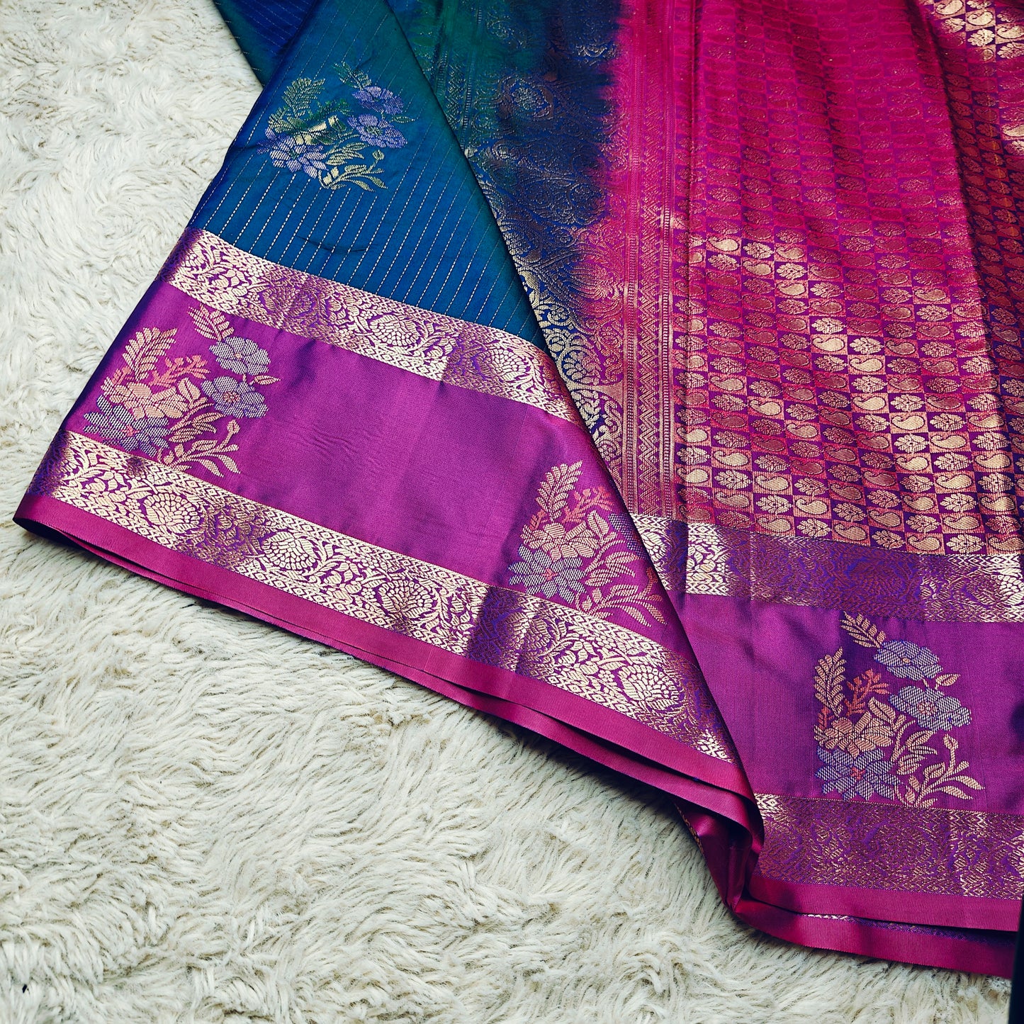 peacock blue semi kanchi butta saree
