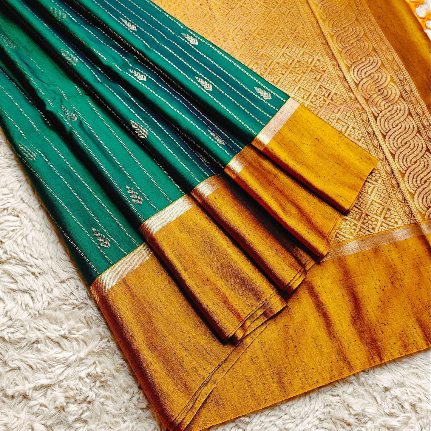 Bottle green soft silk zari lines saree