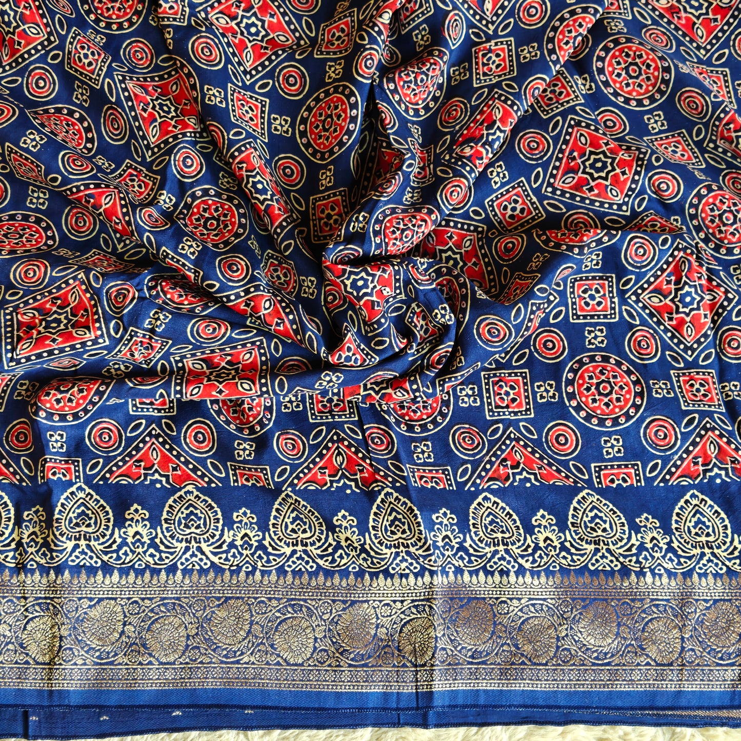 Navy blue ajrakh handblock printed pure dola silk saree