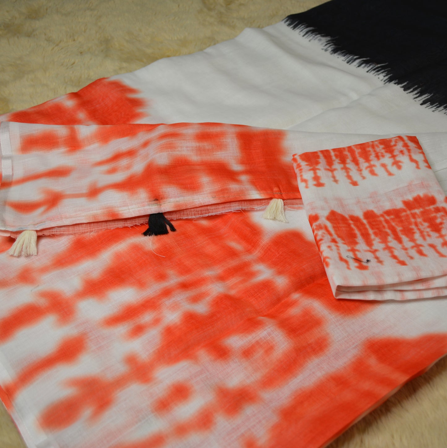 Orange with black linen shibori print saree