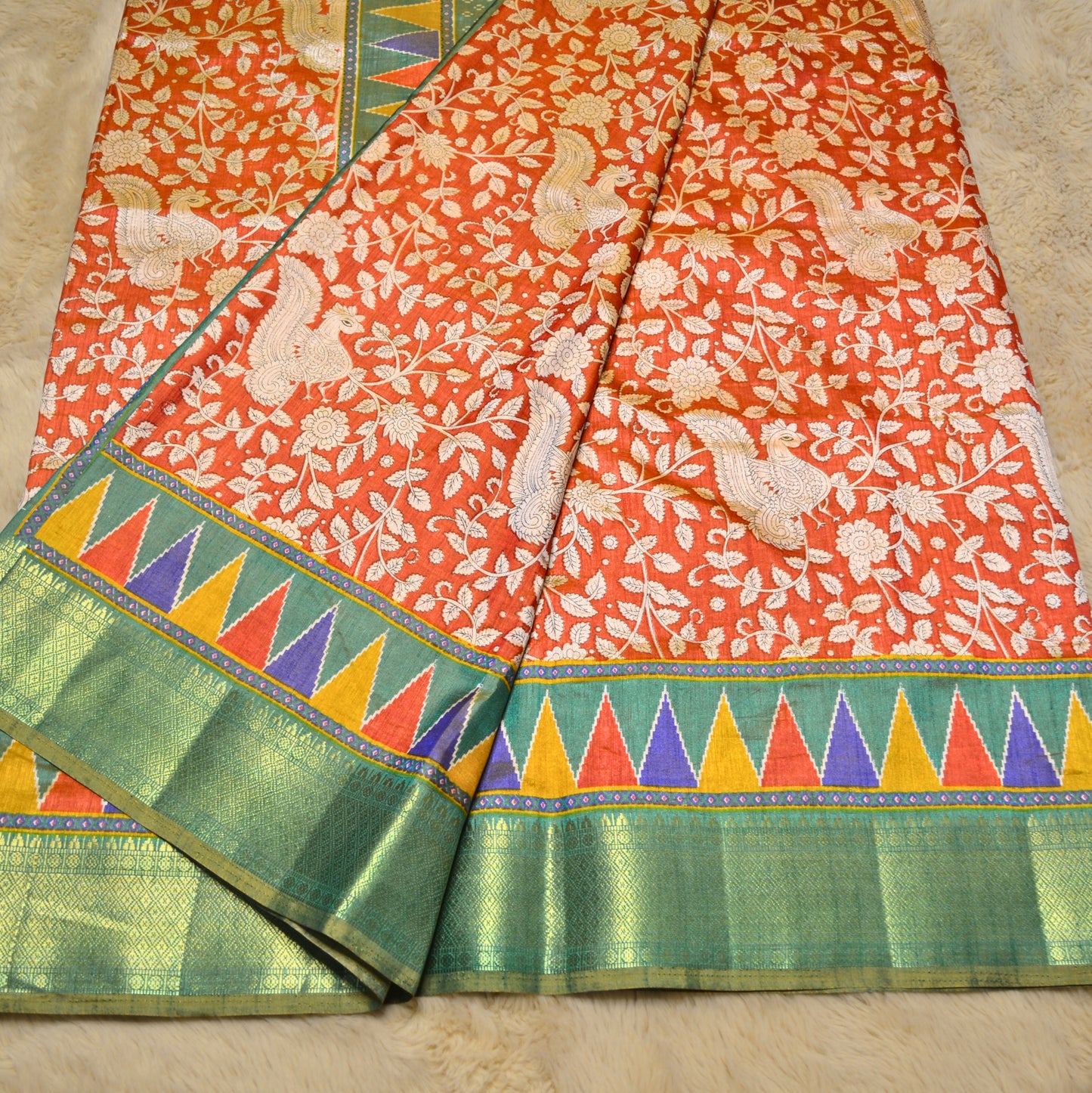 Brick red with green patola saree