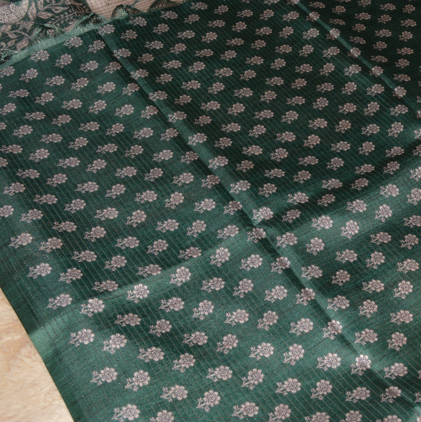 Green semi tussar checks floral border saree
