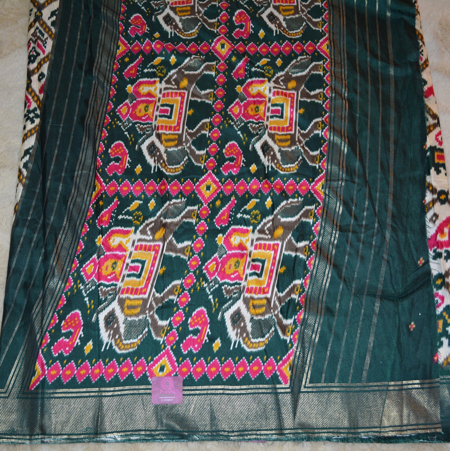 Half-white with green ikkat semi dola saree