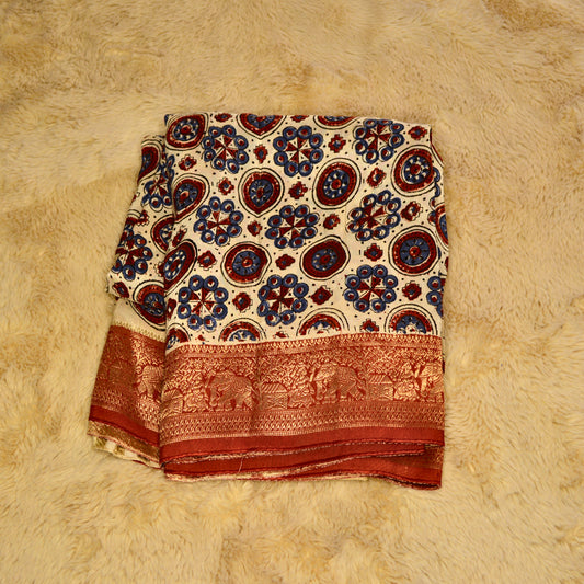 Half-white dola silk ajrakh handblock printed saree
