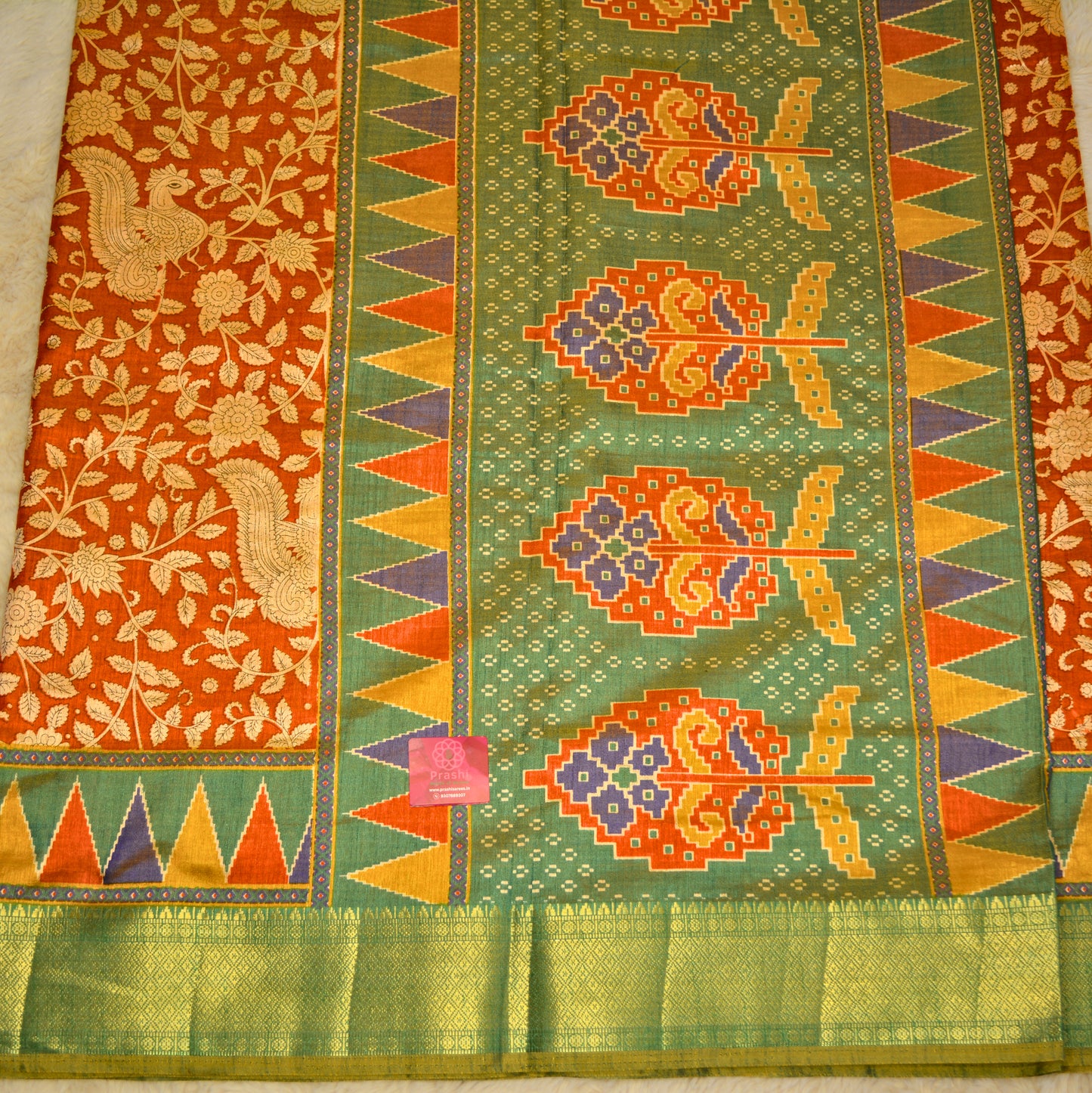 Brick red with green patola saree