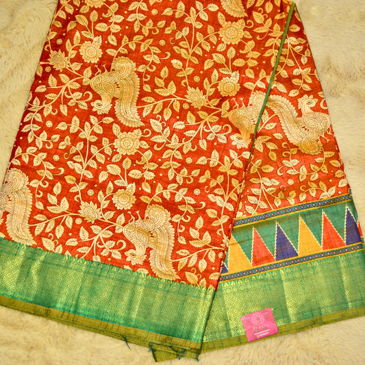 Brick red with green patola saree