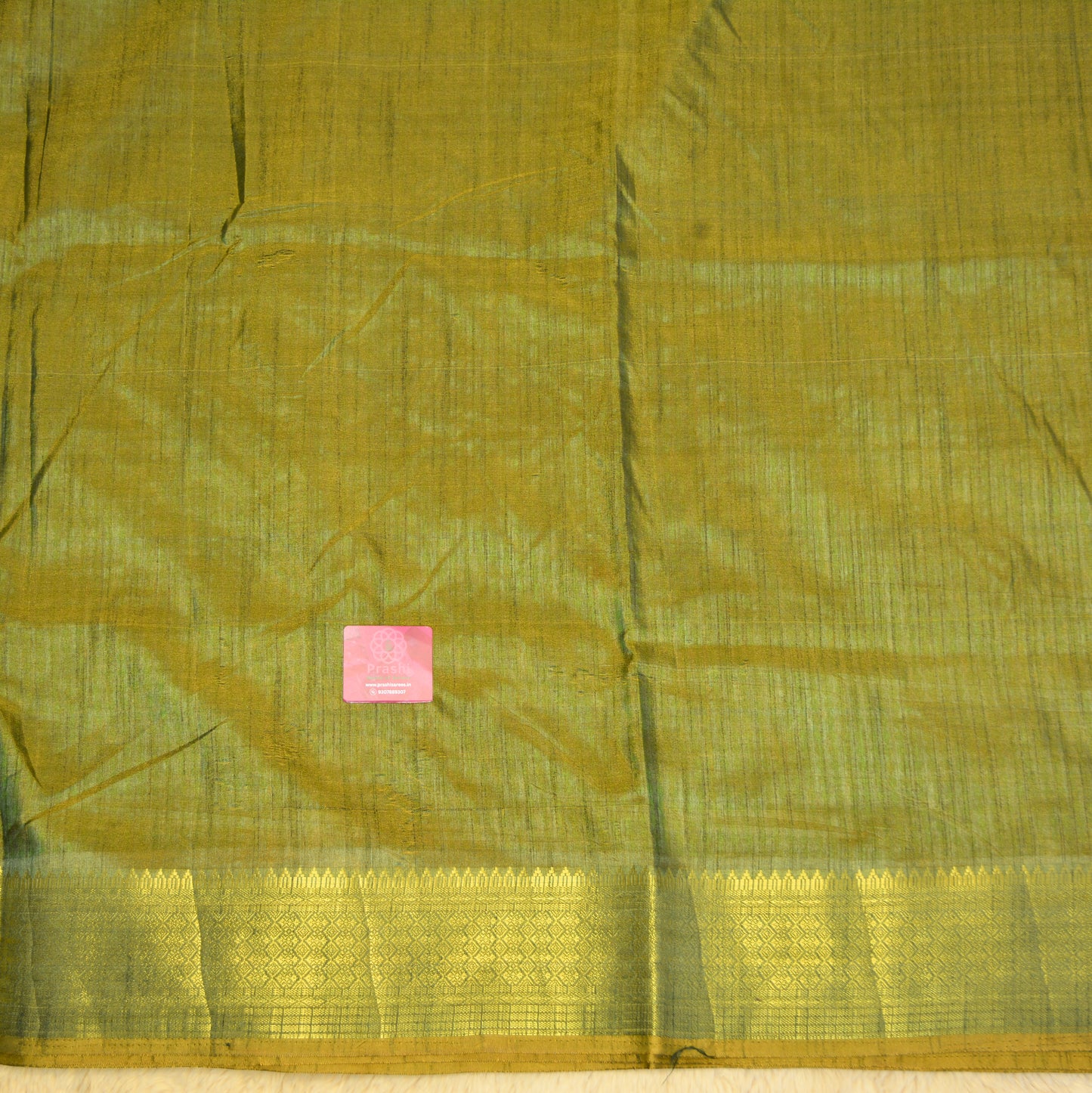 Brick red with green patola saree