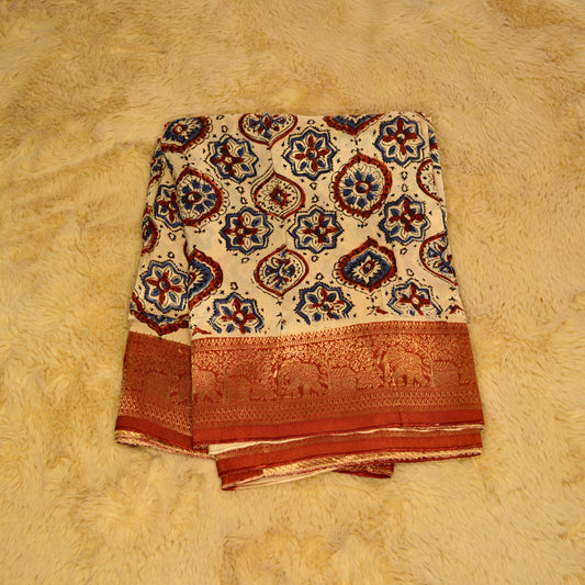 Cream dola silk saree with ajrakh handblock print