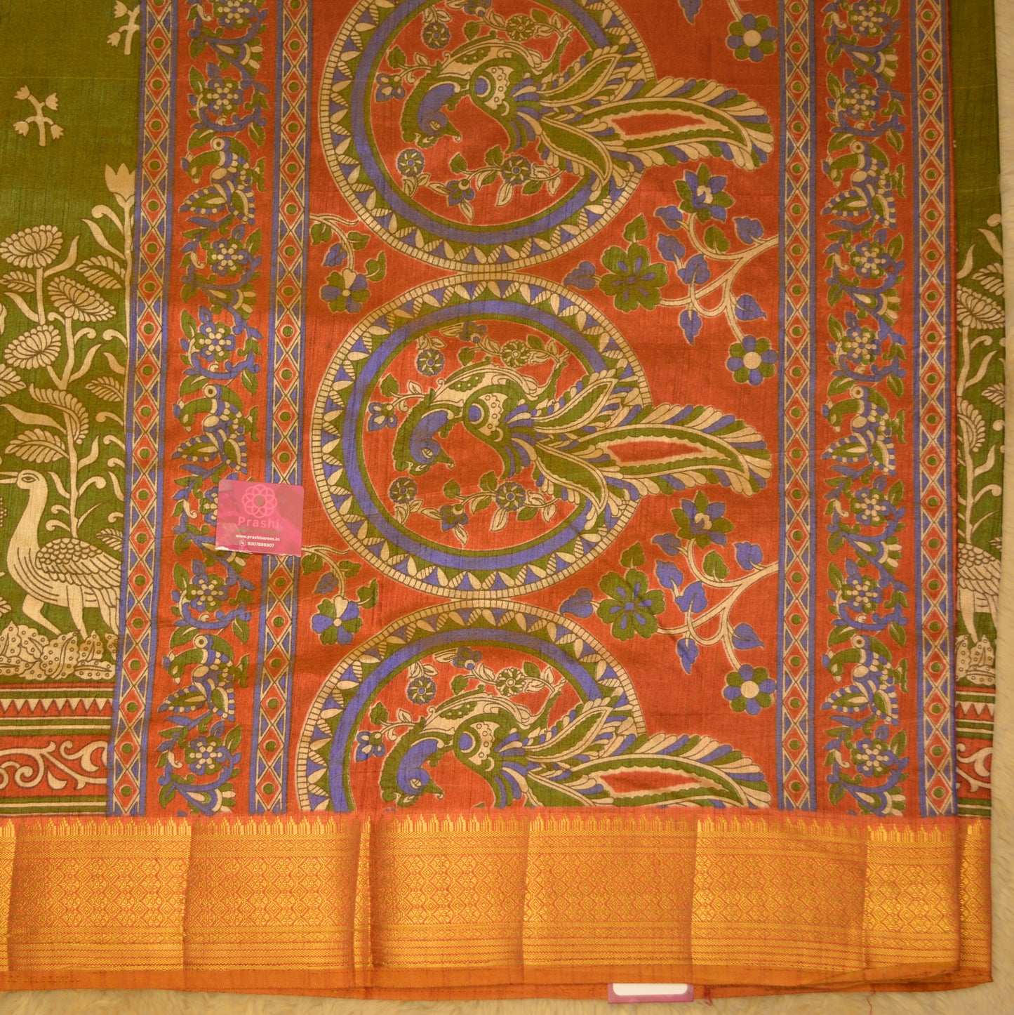 Mehandi green with rust orange patola saree