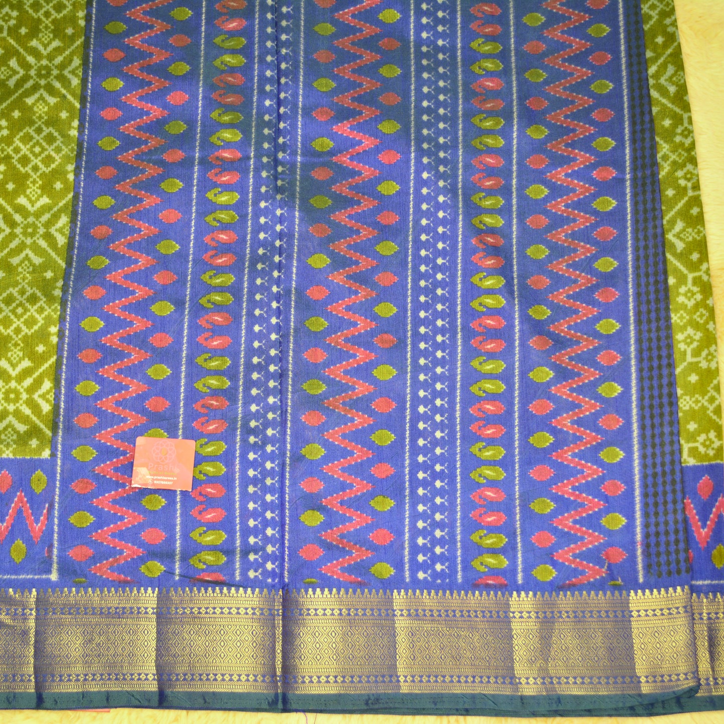 Green with blue patola saree