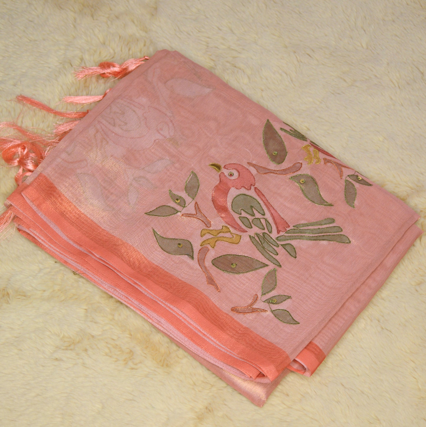 Pastel orange tissue applique work saree