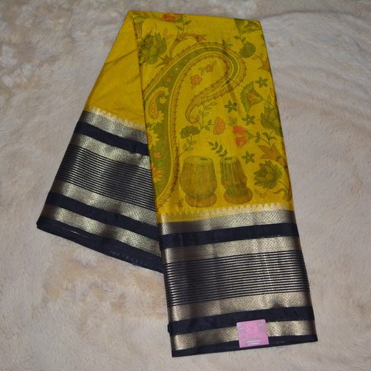 Yellow with black semi crepe kalamkari saree