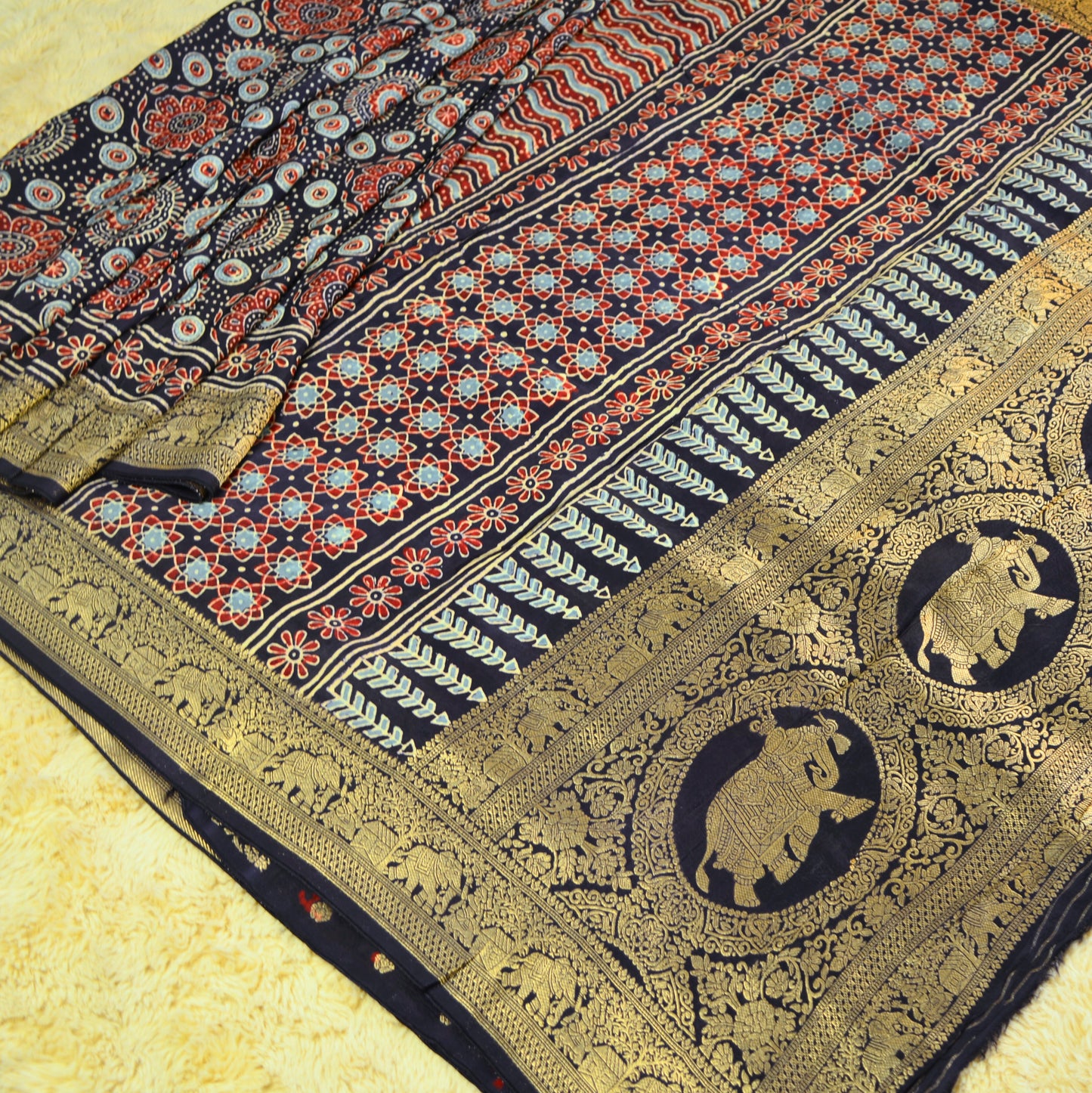 Blue Dola silk saree with ajrakh handblack printed