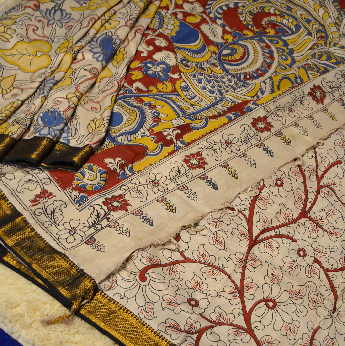 Half-white with blue kalamkari silk saree