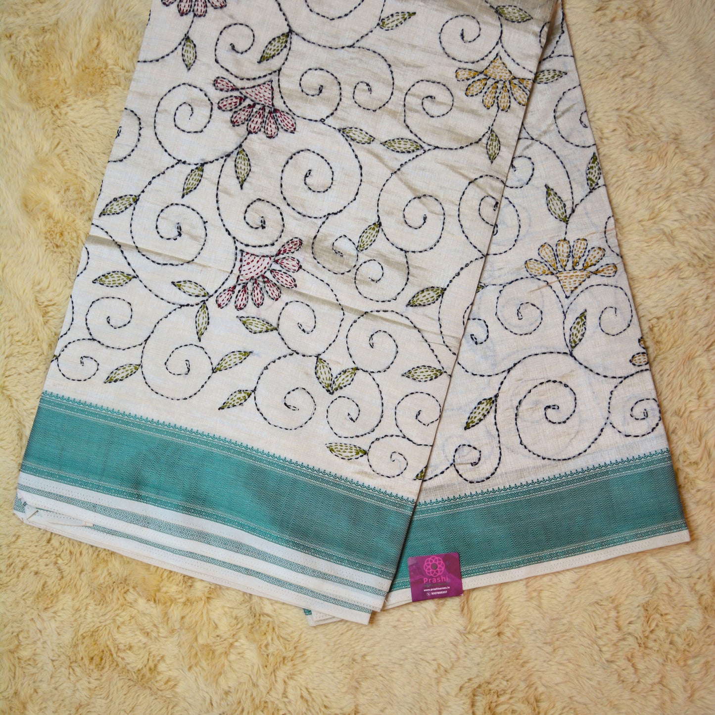Half-white tussar saree with kantha embroidery