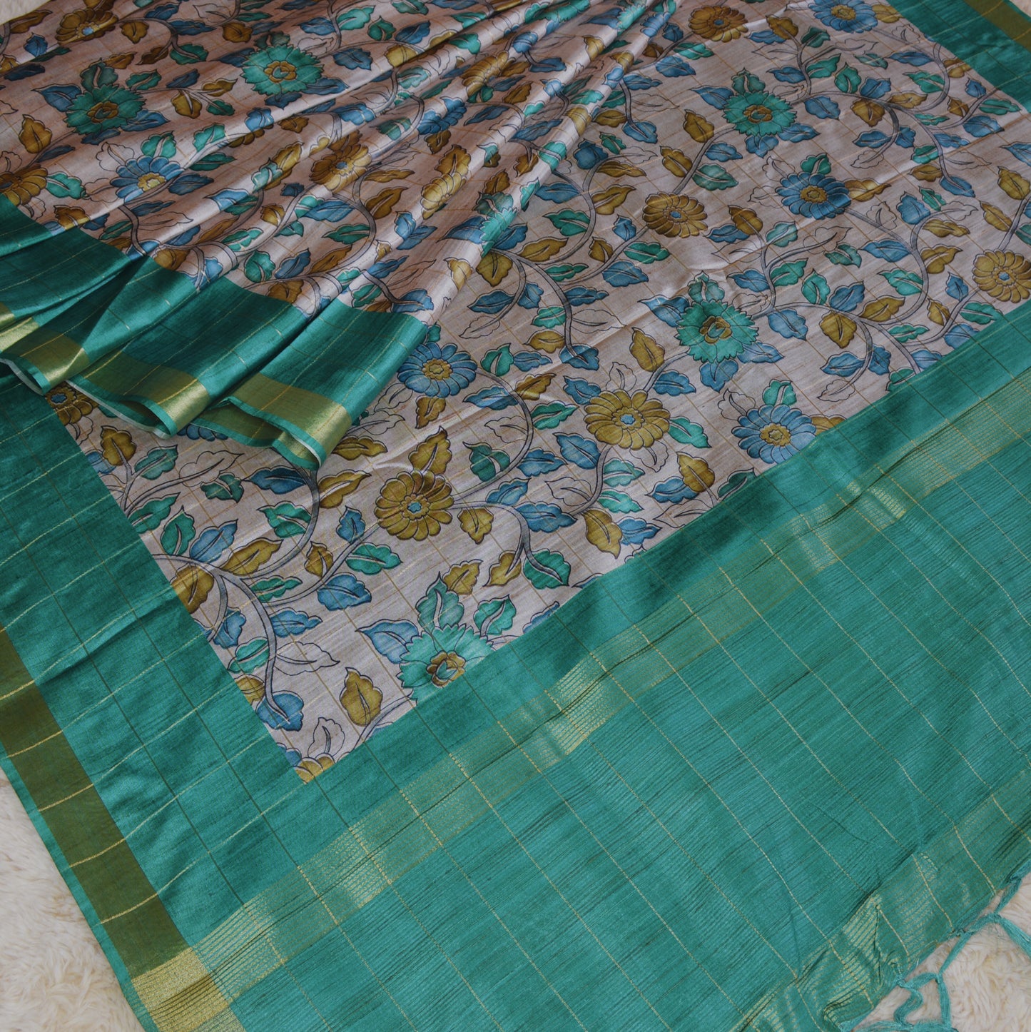 Rama green tussar checks kalamkari saree