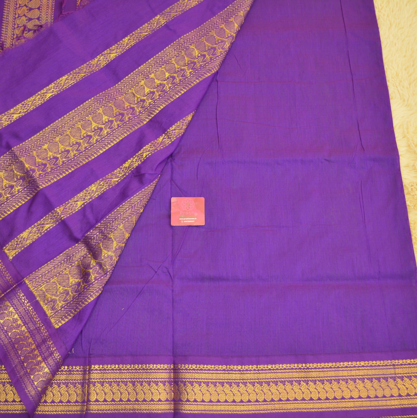 Green handloom kalyani cotton saree with purple contrast