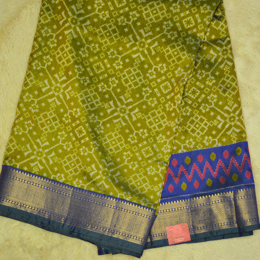 Green with blue patola saree