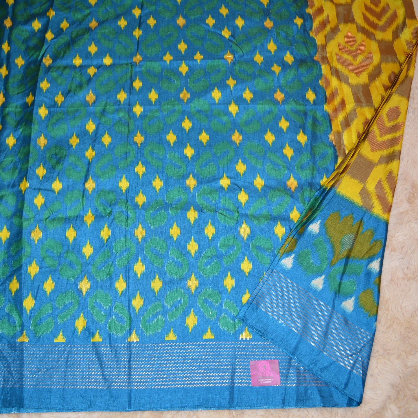 Yellow with blue ikkat semi dola silk saree