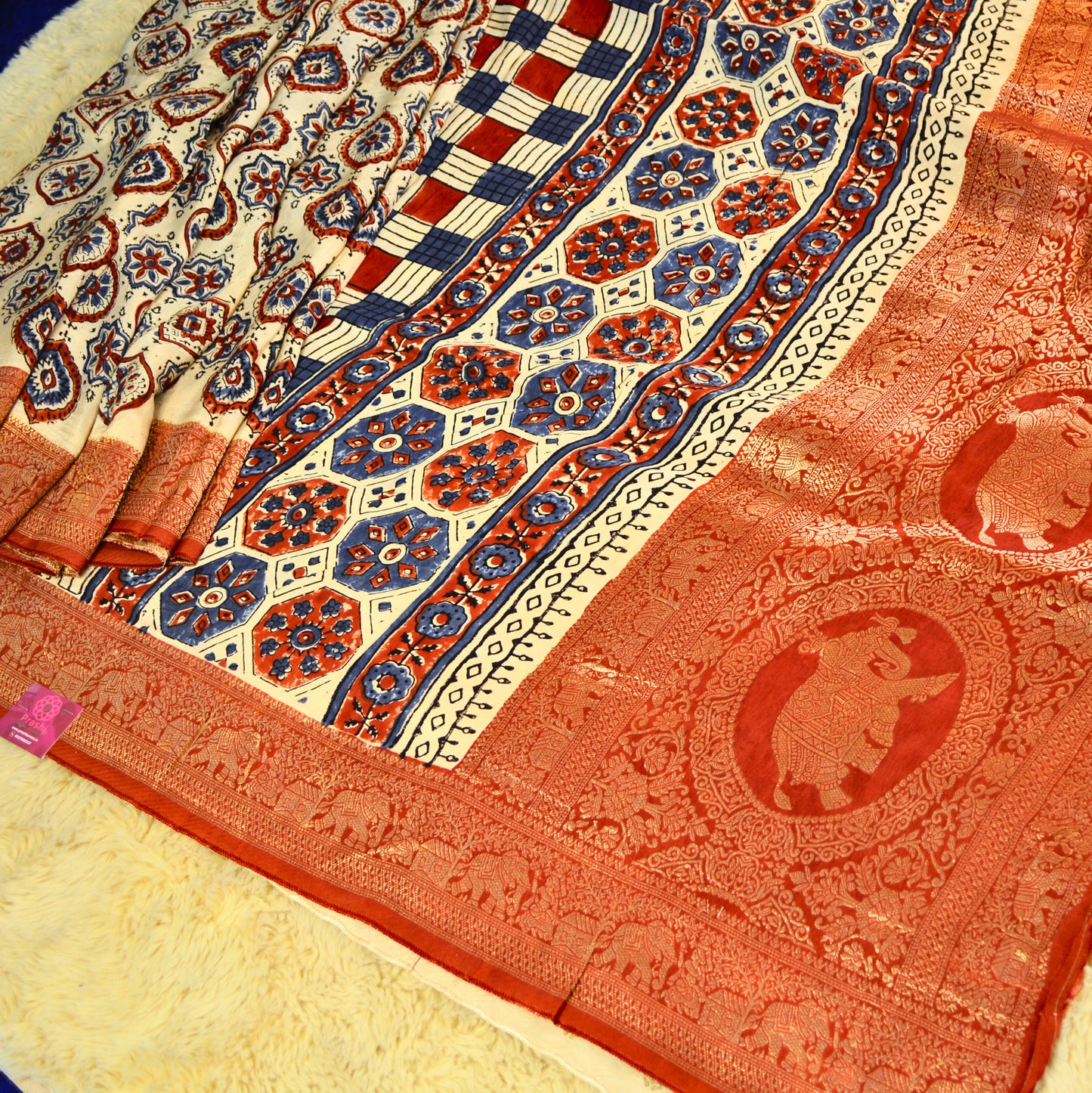 Cream dola silk saree with ajrakh handblock print
