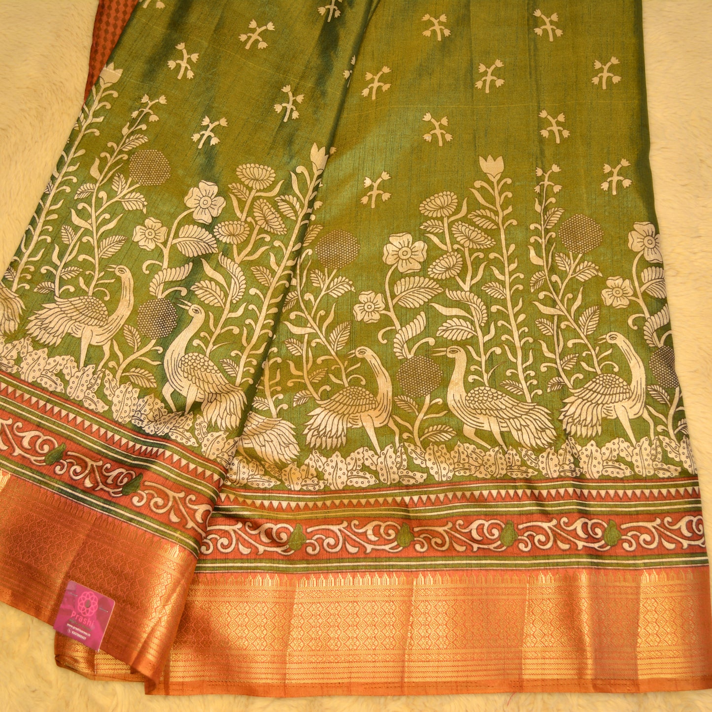 Mehandi green with rust orange patola saree