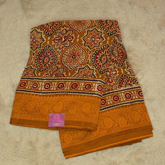 Brown ajrakh handblock printed dola silk saree