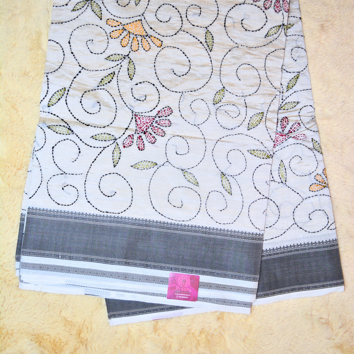 Half-white tussar saree with kanths embroidery