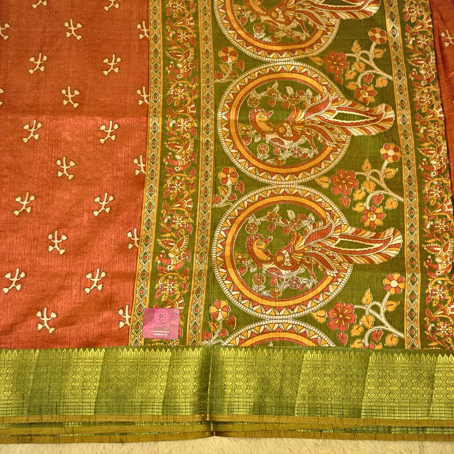 Brick red with green patola saree