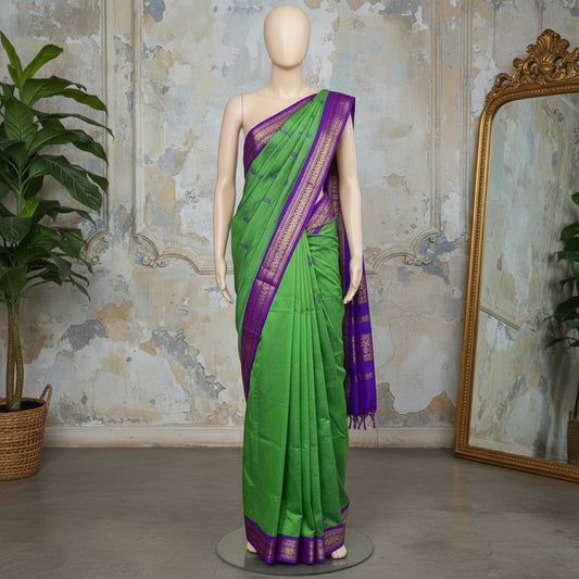 Green handloom kalyani cotton saree with purple contrast