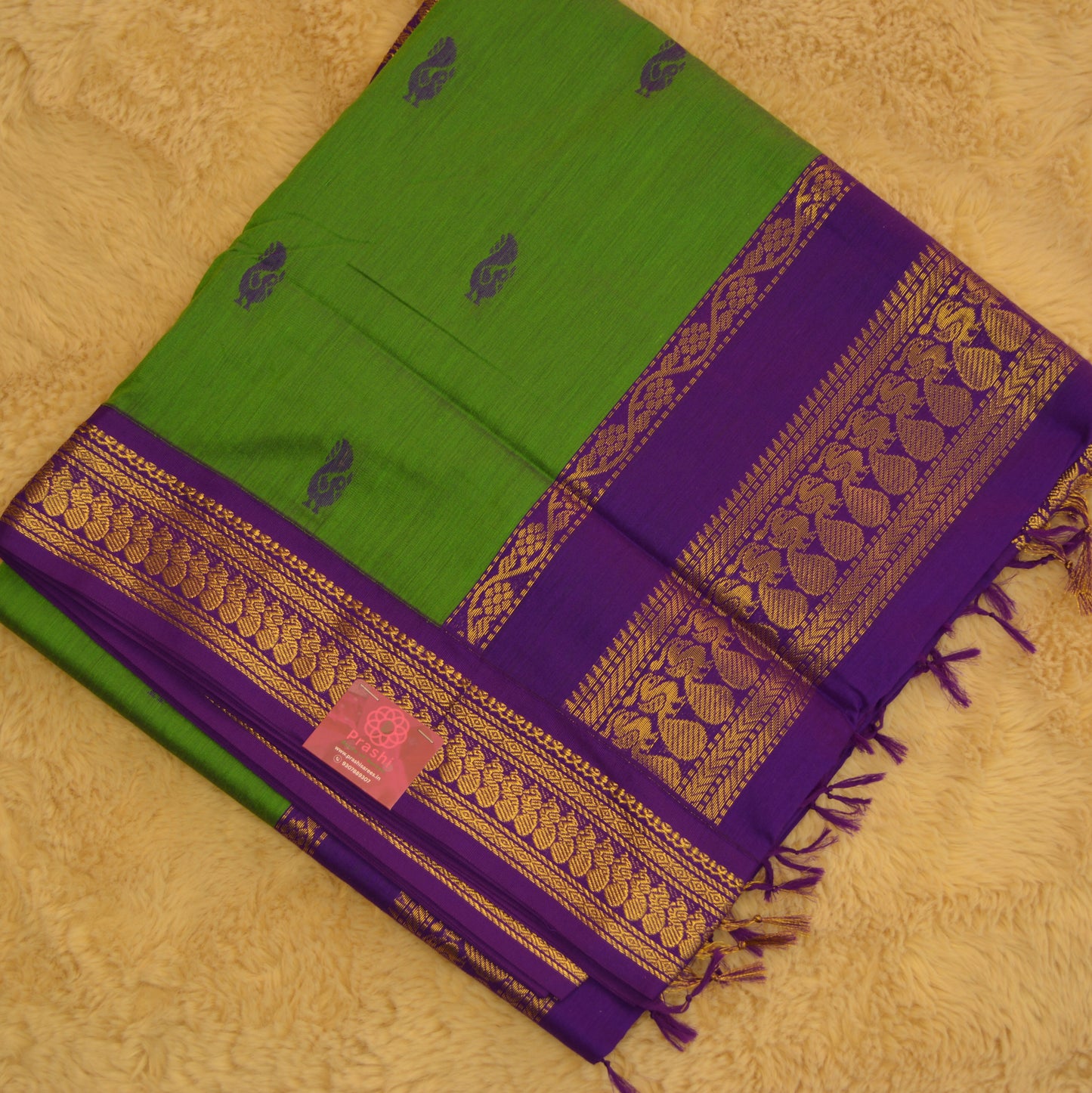Green handloom kalyani cotton saree with purple contrast
