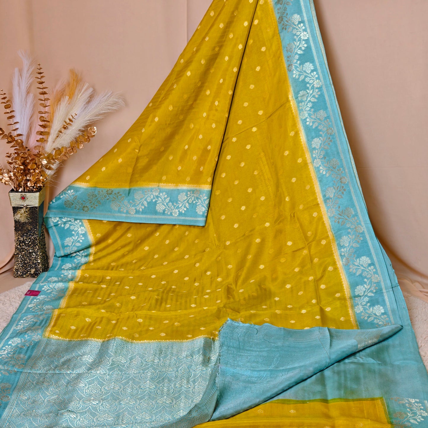 Yellow pure viscose border saree with buttas