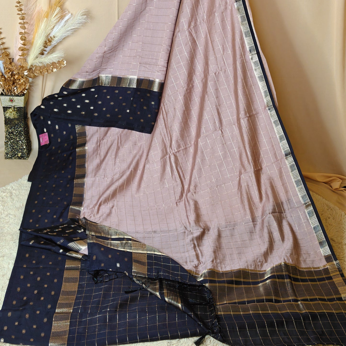 Peach shade muslin saree with checks