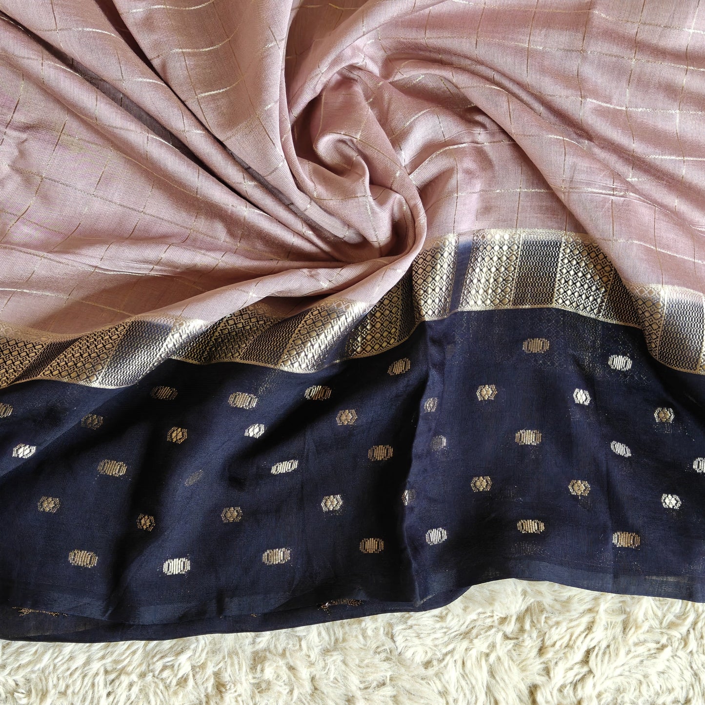 Peach shade muslin saree with checks