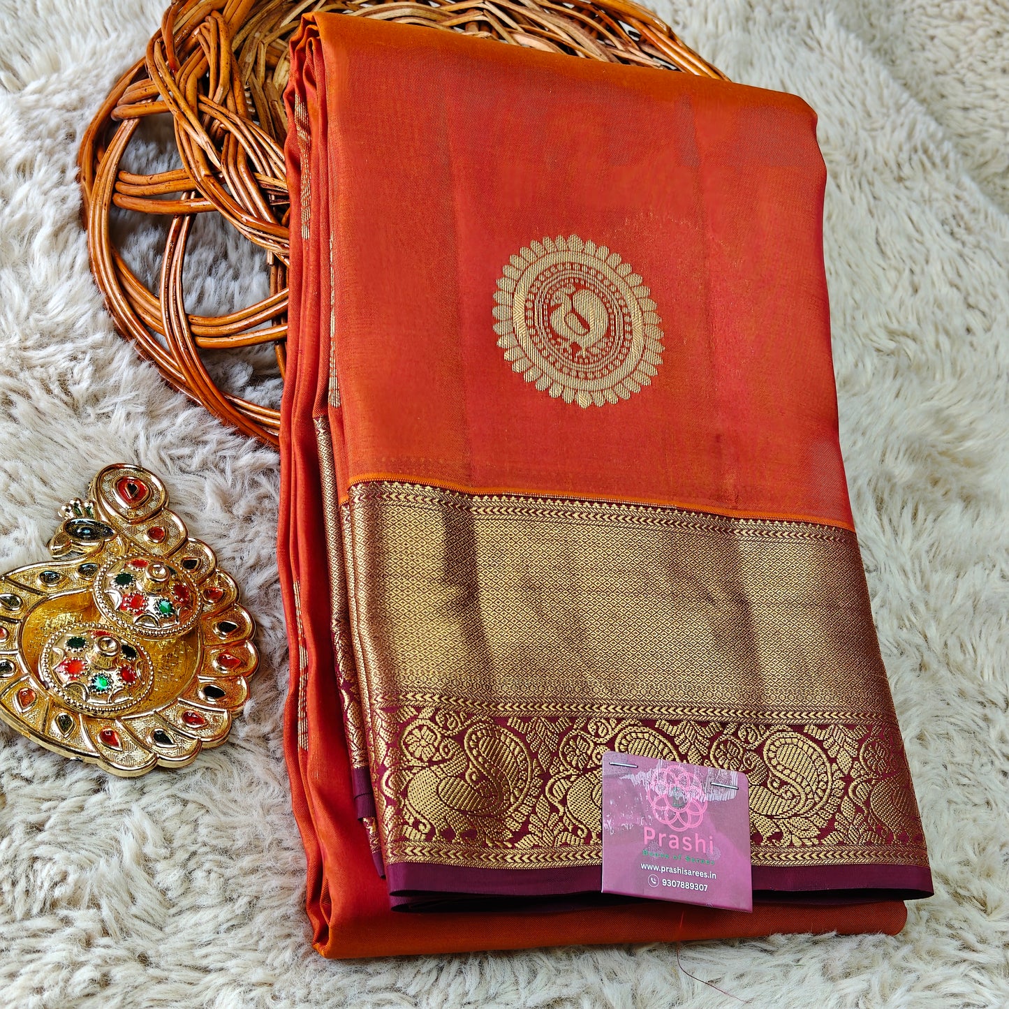 Rust orange pure silk kanchi butta saree