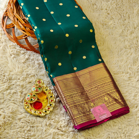 Bottle green Pure silk kanchi butta saree