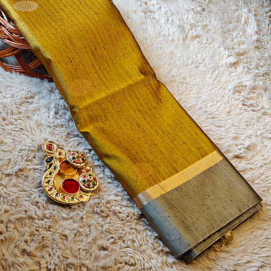 Mustared yellow soft silk zari lines saree
