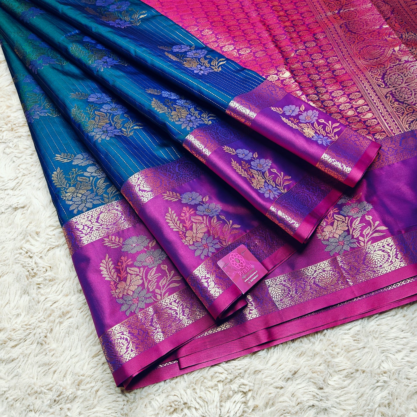 peacock blue semi kanchi butta saree