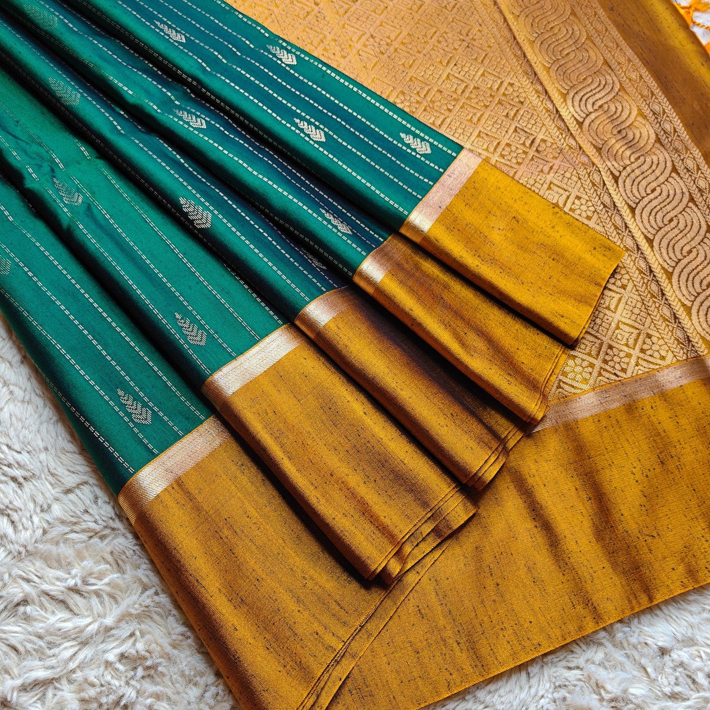 Bottle green soft silk zari lines saree