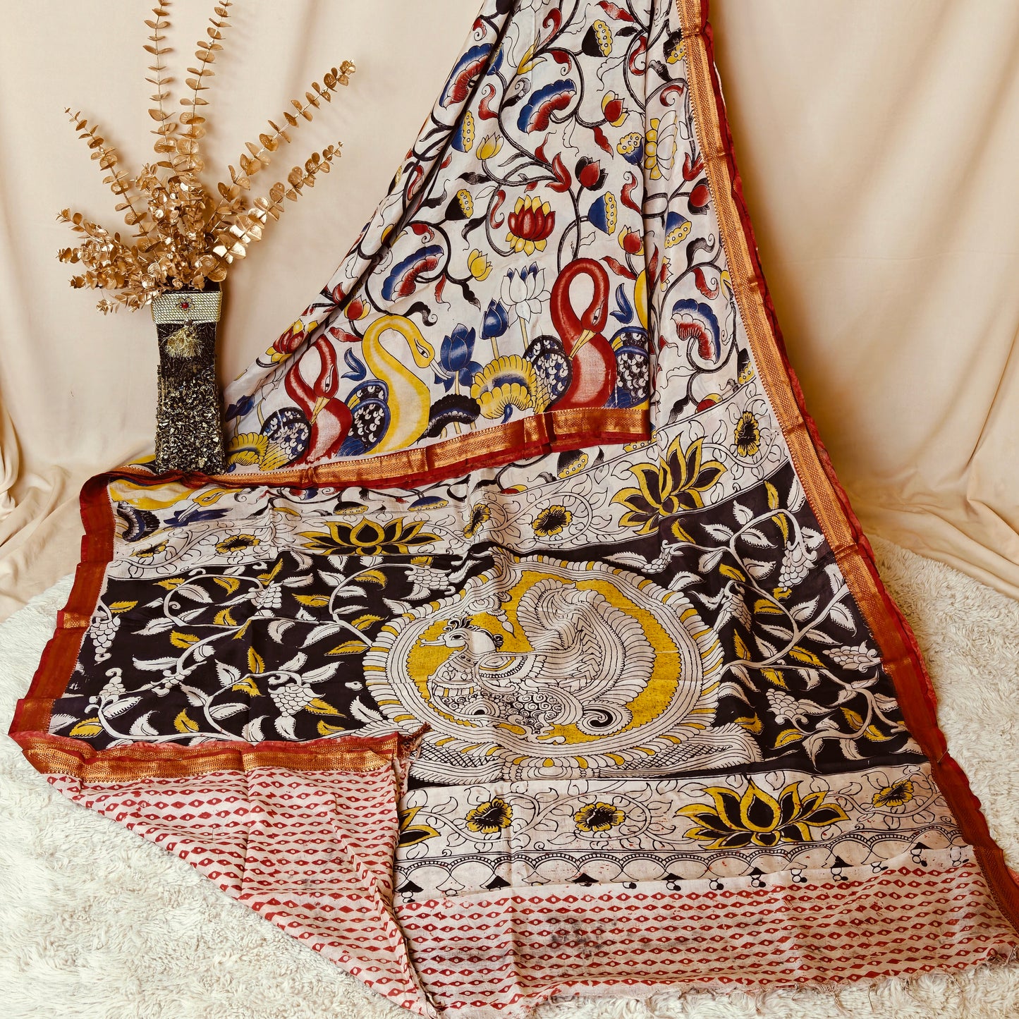 Half-white with red kalamkari silk saree