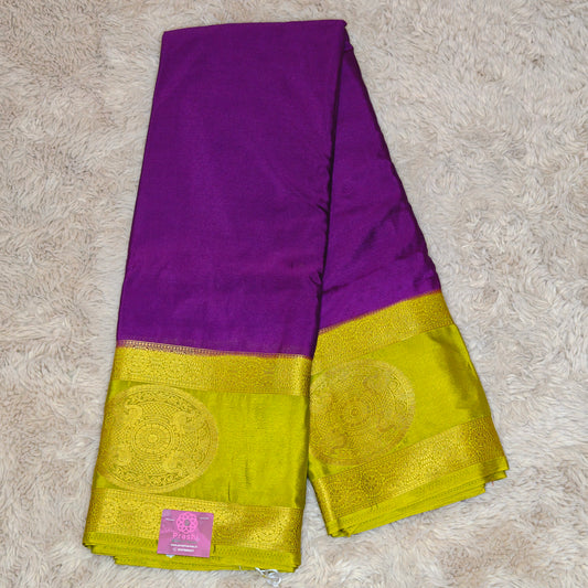 Purple with mehandi green semi mysore crepe bentex butta saree