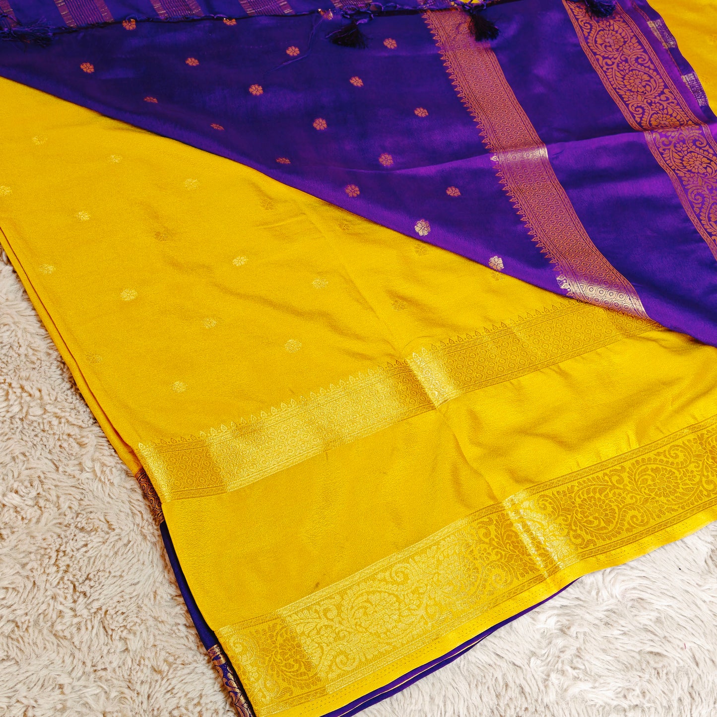 Yellow and purple semi mysore crepe butta saree