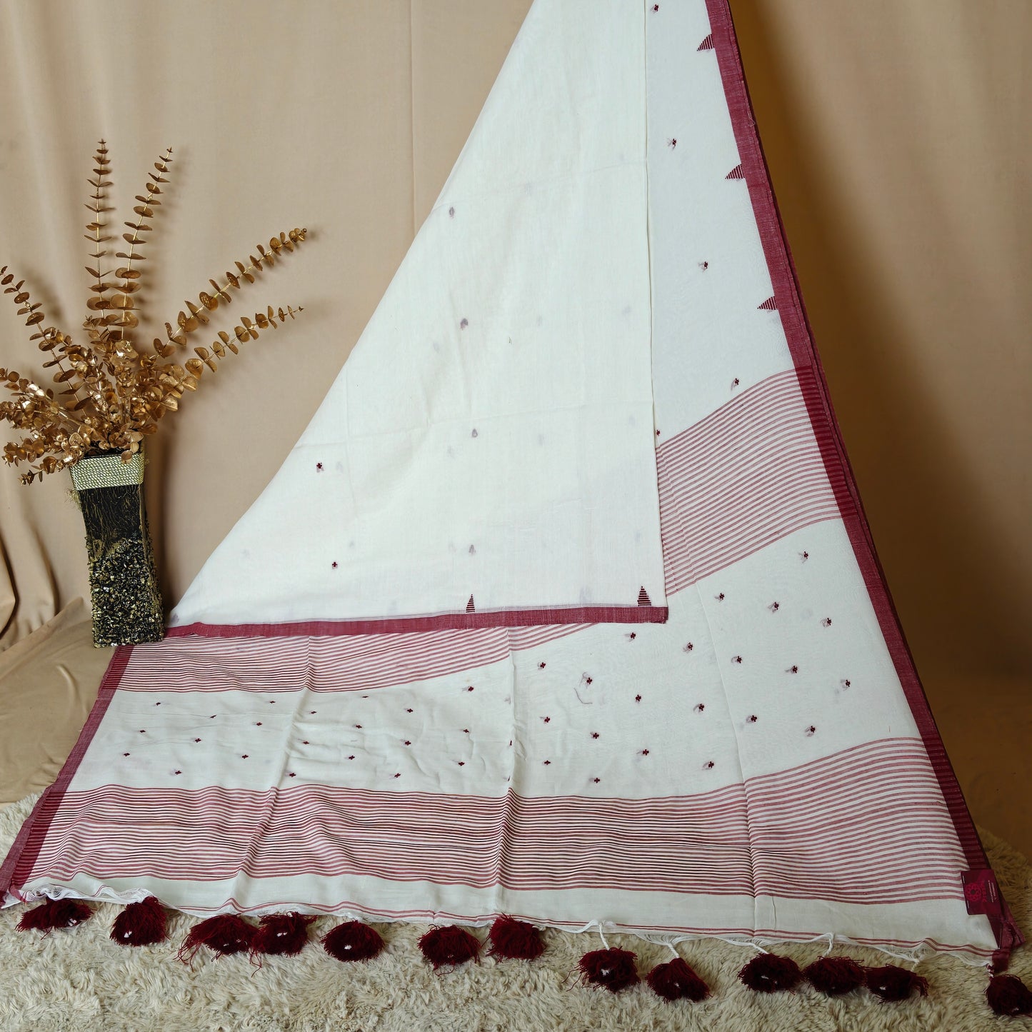 white handloom mul cotton plus butta saree