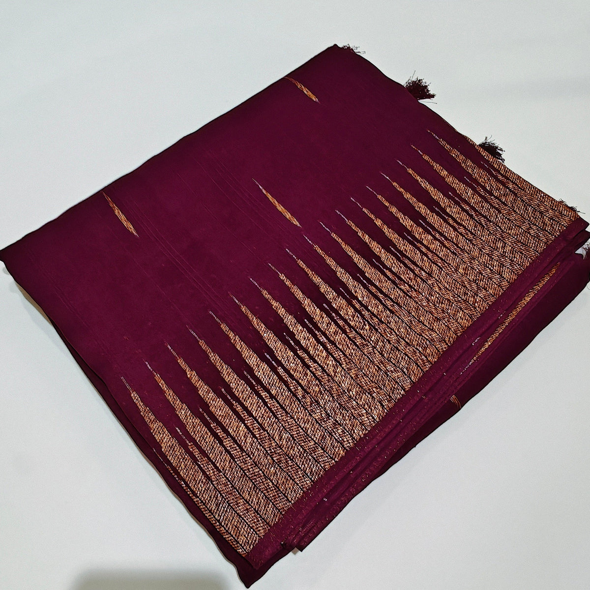 Wine colour temple tussar saree