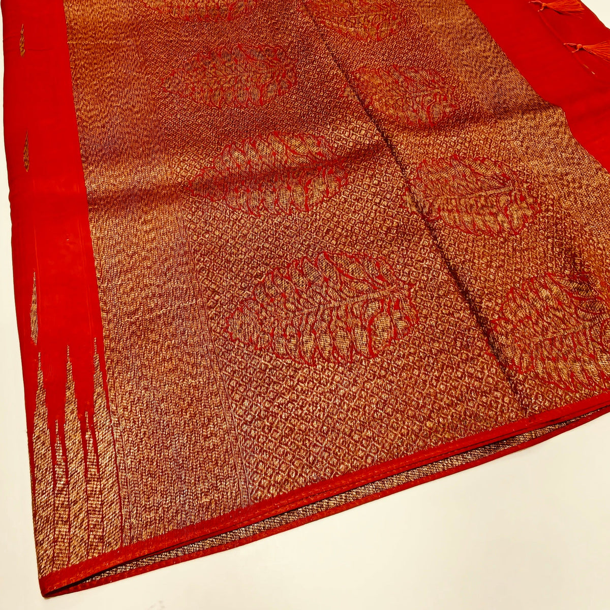 Orange temple tussar saree
