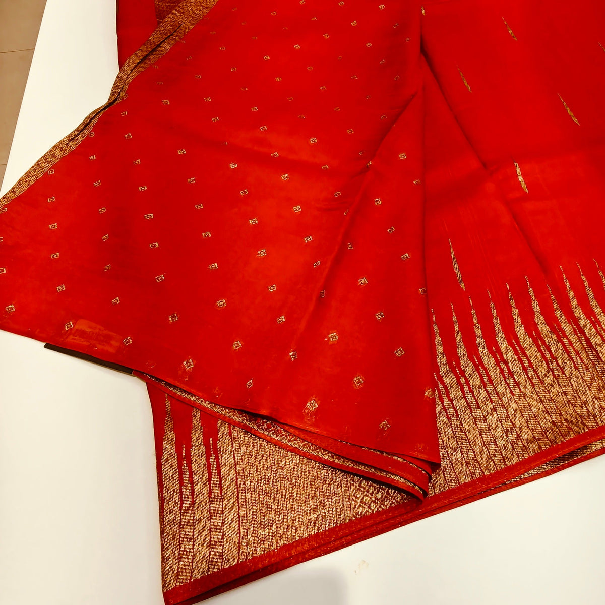 Orange temple tussar saree