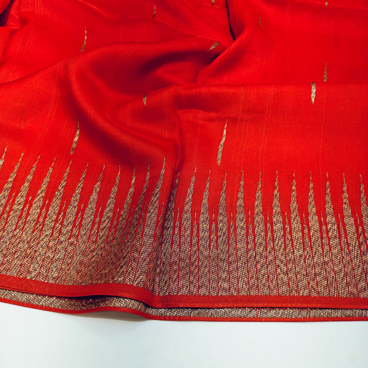 Orange temple tussar saree